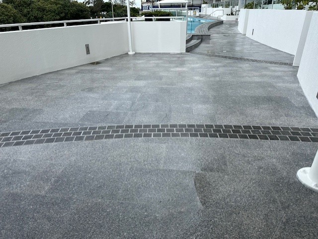 Completed pool deck paving at Sebel Maroochydore.